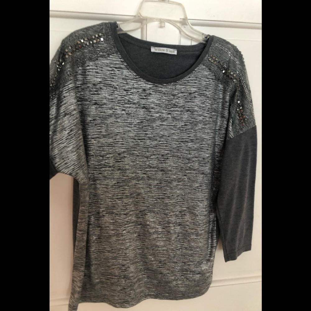 Willow & Jane grey sweater with decorative shoulder details.